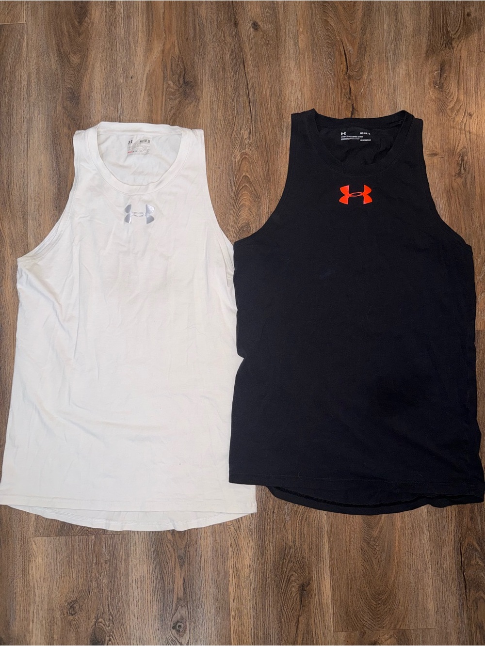 Under Armour Men’s Tank Tops — Black with Orange Logo & White with Silver Logo